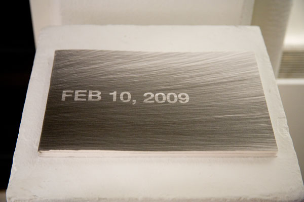 Photograph of the everydatum book, showing a grid of daily data visualizations.